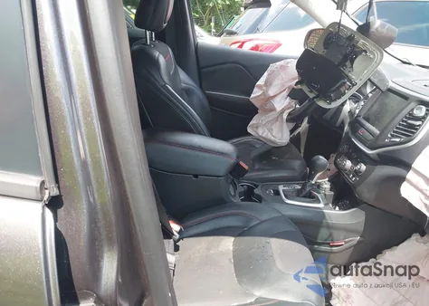 2015 Jeep Cherokee Trailhawk from USA, damaged, VIN 1C4PJMBS5FW687743